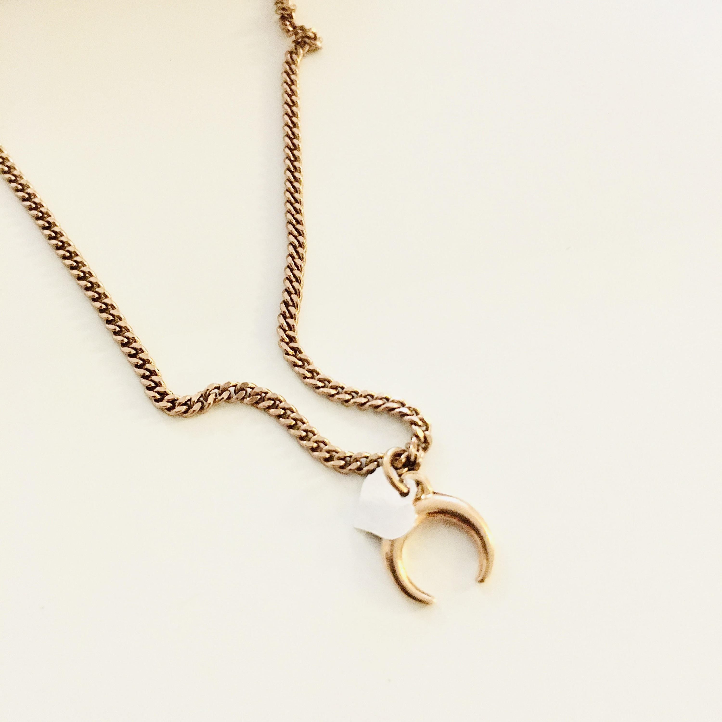 Crescent Moon Necklace in Gold.