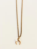 Crescent Moon Necklace in Gold.