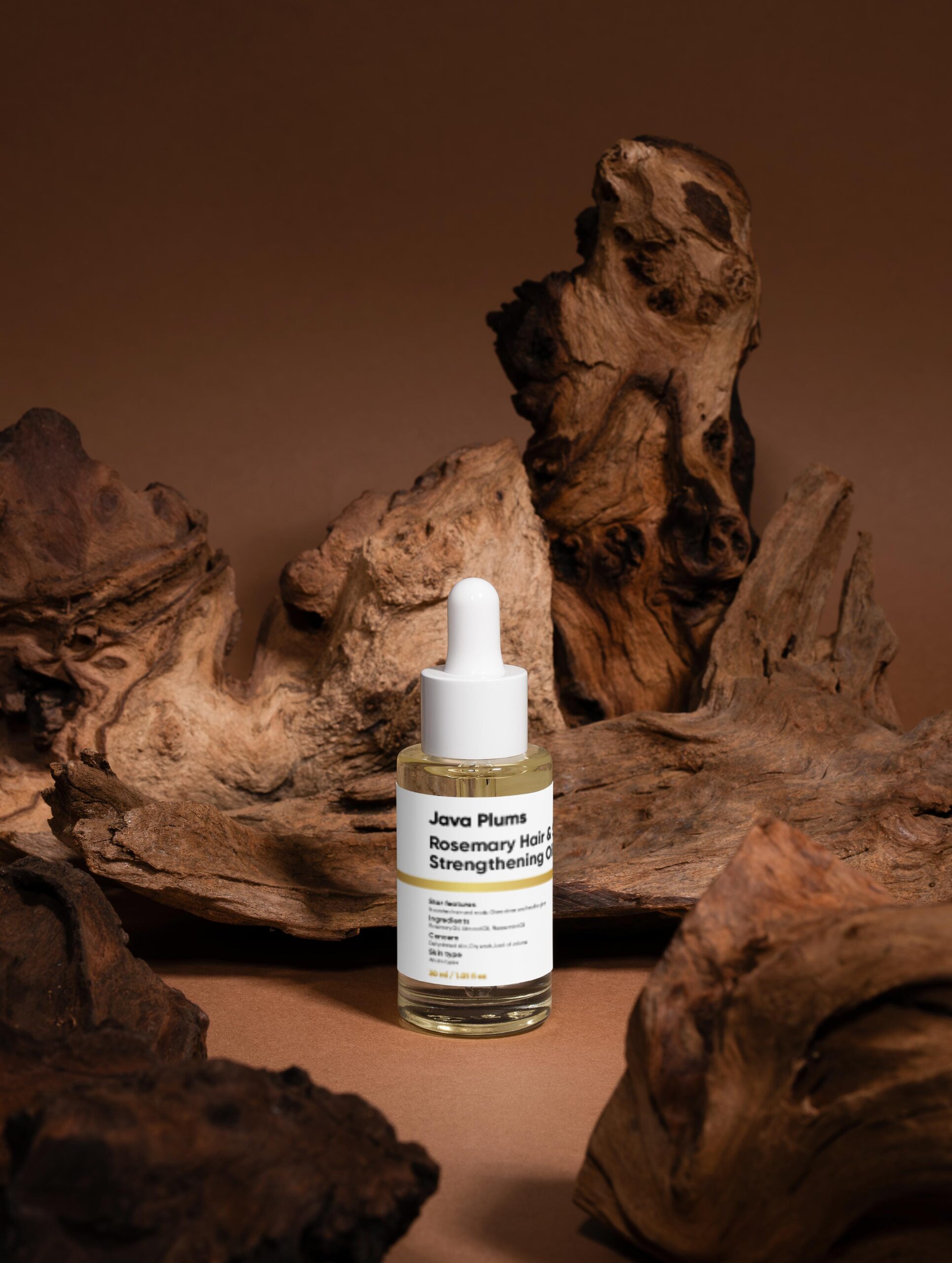 Rosemary Hair & Scalp Strengthening Oil that nourishes roots, promotes growth, and adds natural shine.
